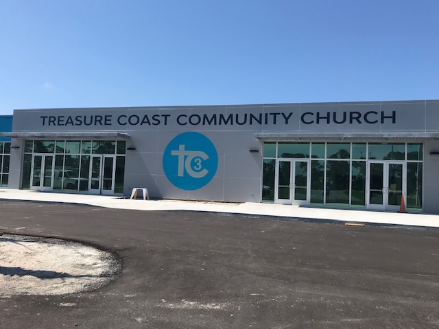 treasure coast community church logo outside of building