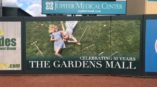 The Garden's Mall sports stadium advertisement 
