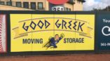 yellow Good Greek Moving Storage sports stadium advertisement 