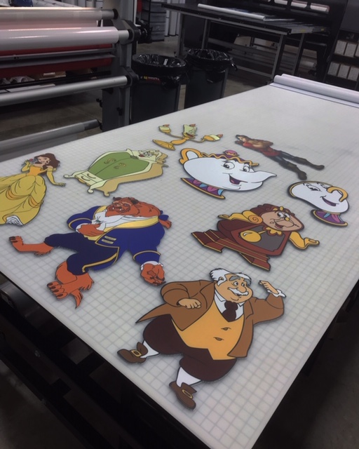 printed cut outs of beauty and the beast characters
