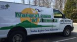 Natural Lawn of America white vehicle wrap for van by SpeedPro 
