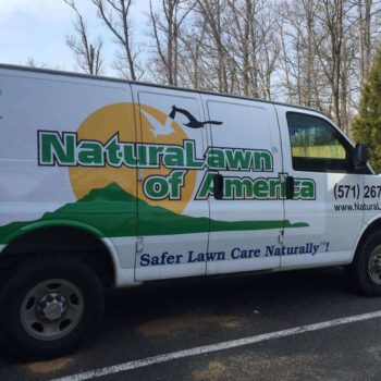 Natural Lawn of America white vehicle wrap for van by SpeedPro 