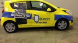 IScreen Service yellow vehicle wrap by SpeedPro 