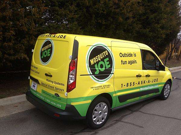 Mosquito Joe yellow vehicle wrap for van by SpeedPro 