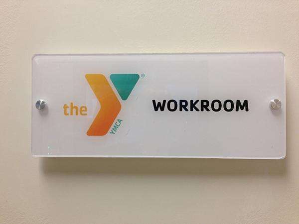 YMCA glass sign for workroom