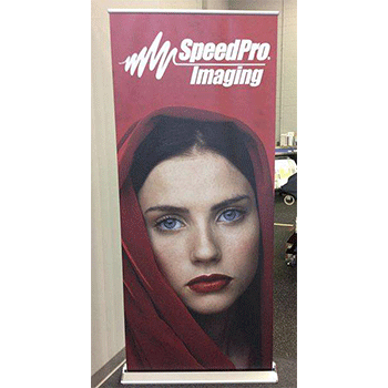 SpeedPro large banner of woman's face