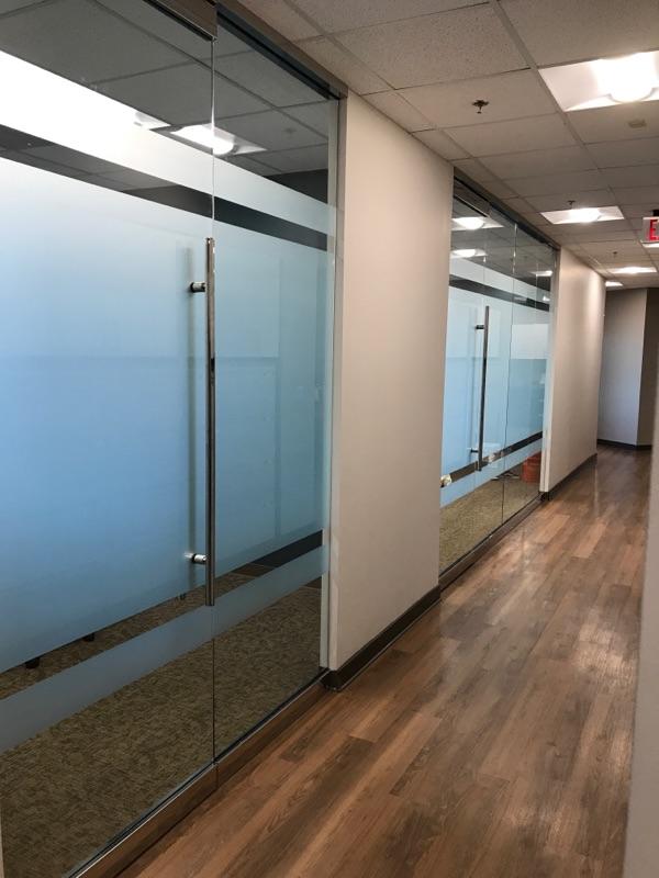 Minimal glass panel graphic for office doors