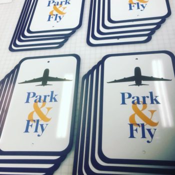 Park and fly parking spot signs