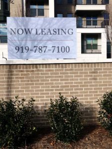 Image of a leasing sign displayed outdoors.