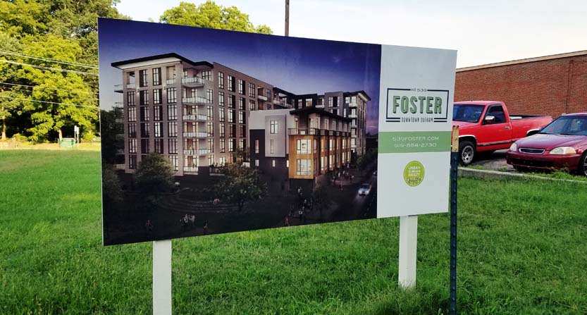 Image of a post and panel sign for property in Durham, NC.