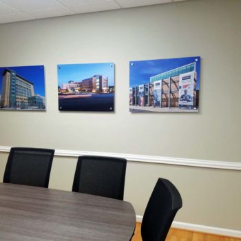 City scene prints in a conference room 
