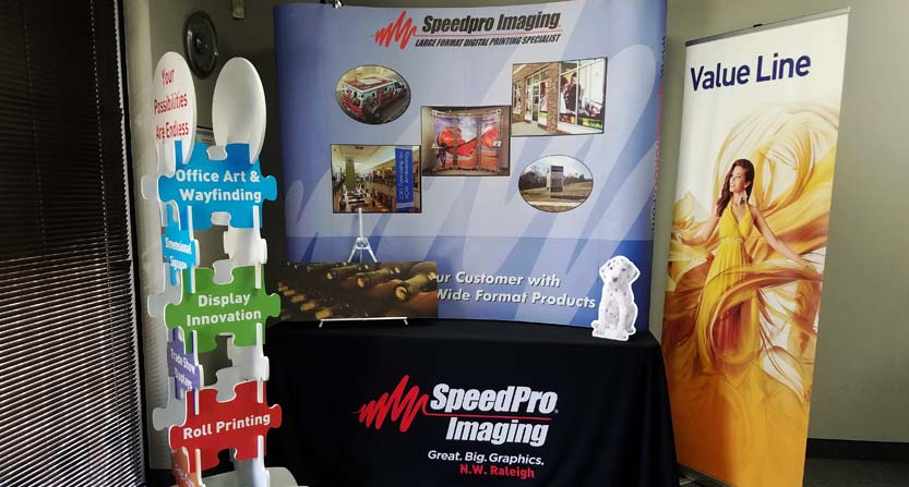 SpeedPro banner stand and table display