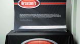 Braxton's Dealer Services table throw and banner display