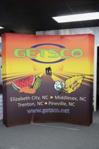 Image of a stretched fabric pop up display for a tradeshow event.