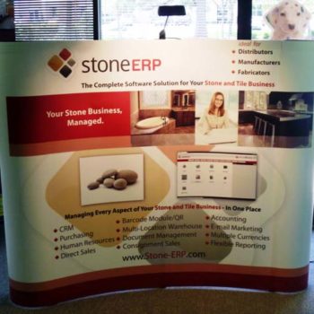 Image of a curved pop up trade show display for an event.