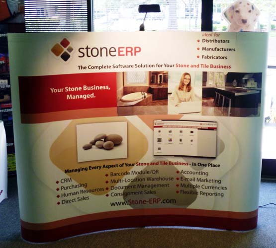 Image of a curved pop up trade show display for an event.