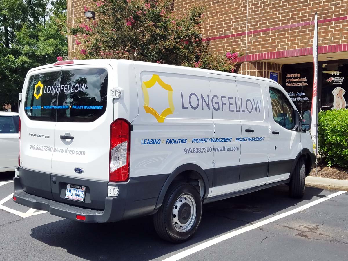 Image of cut vinyl vehicle graphics, installed on a van in Durham, NC.