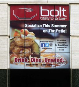 Image of solid window graphics, installed on restaurant windows in Raleigh, NC.