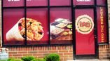 Image of opaque window graphics, installed on a store front in Cary, NC.