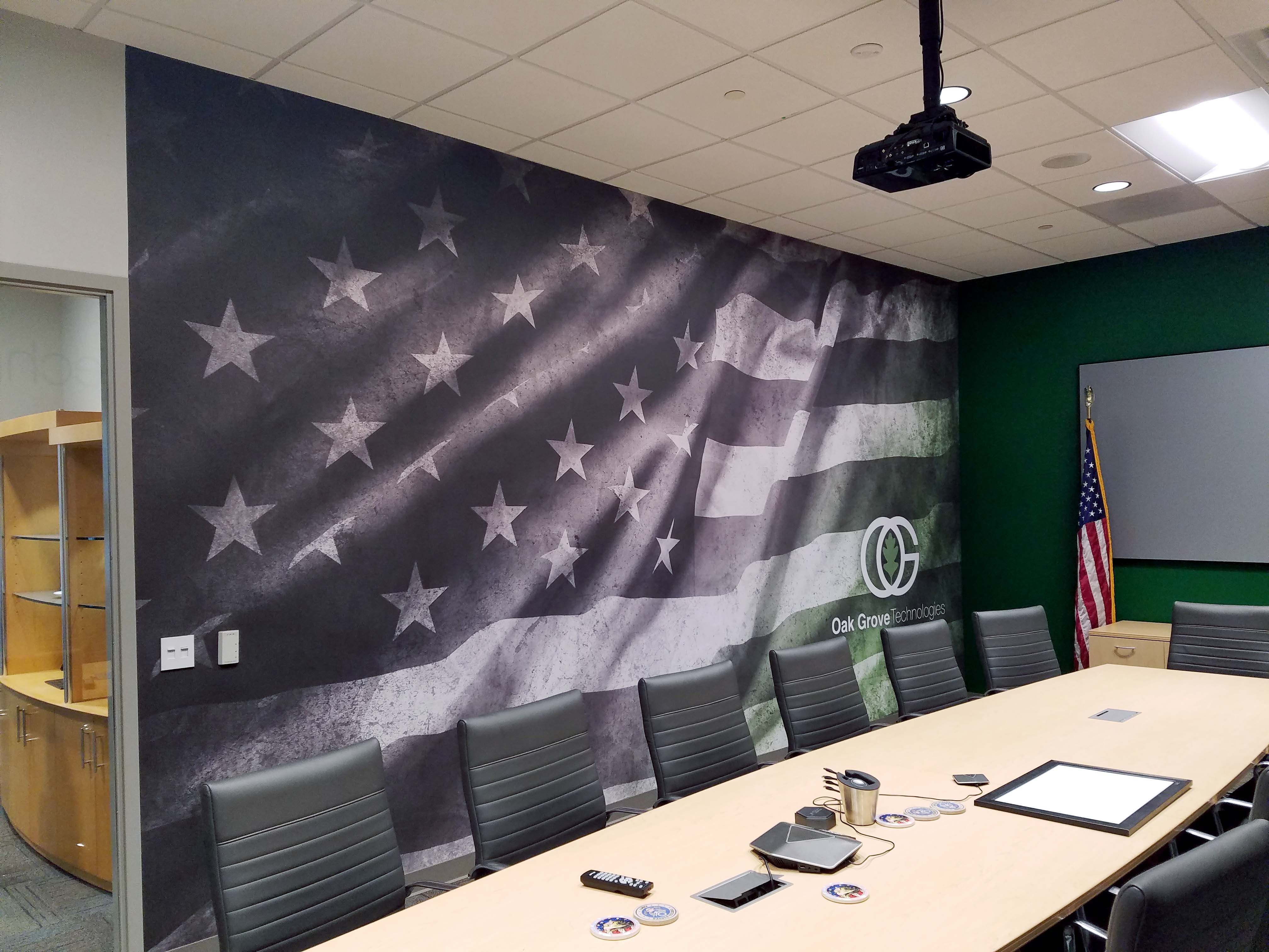 Oak Grove Technologies conference room with American flag wall mural