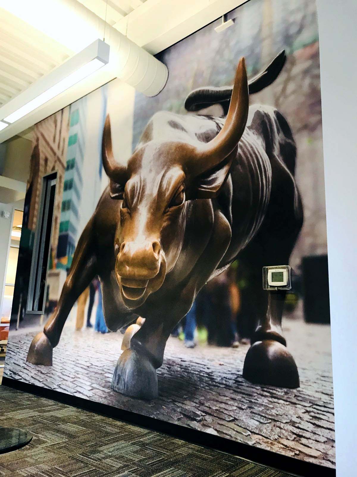 Wall mural of a bull statue