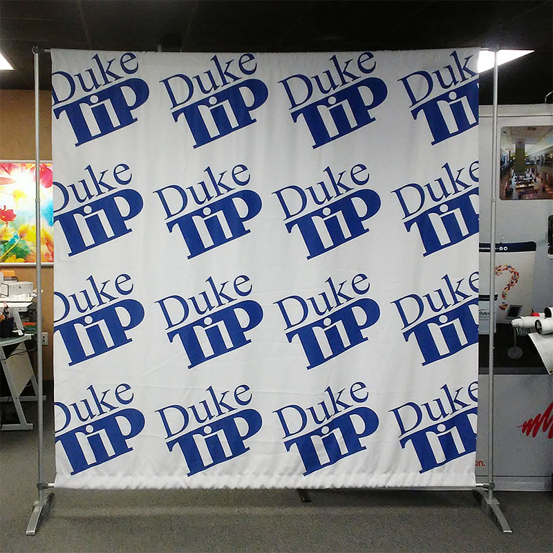 step and repeat photo backdrop with silver stand for Duke TIP event, Durham