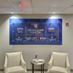 wallpaper with mounted acrylic sign for Coldwell Banker HPW lobby, Raleigh