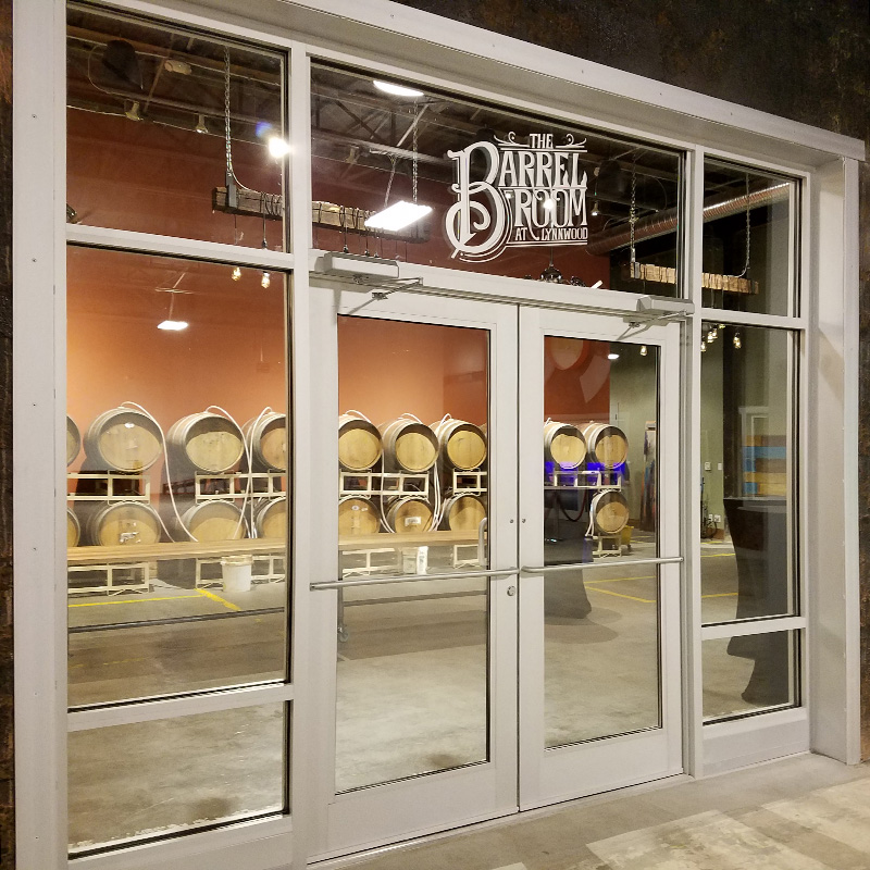 Storefront window lettering and logo graphics for The Lynnwood Brewing Company Barrel Room, Raleigh