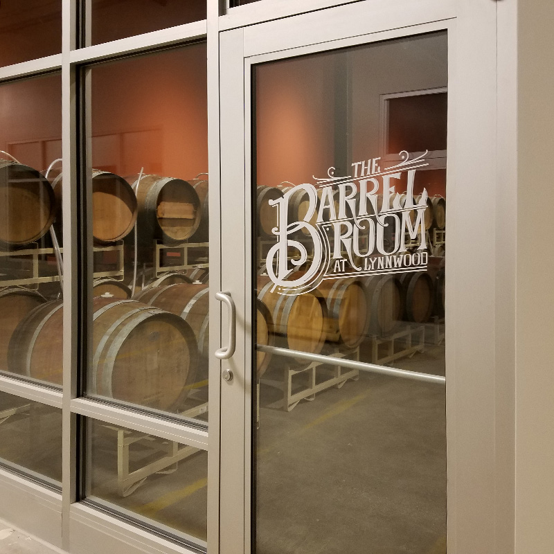 Storefront window lettering and logo graphics for The Lynnwood Brewing Company Barrel Room, Raleigh