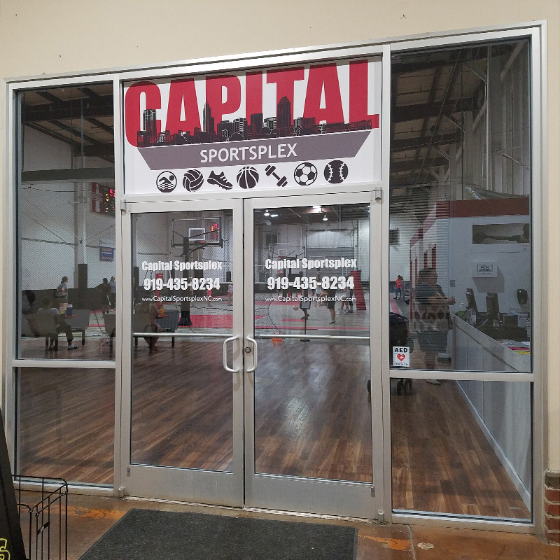 Storefront window lettering and logo graphics for Capital Sportsplex, Wake Forest
