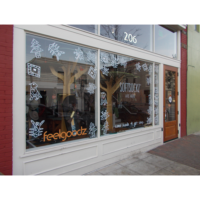 Storefront window lettering and logo graphics for Feelgoodz, Raleigh