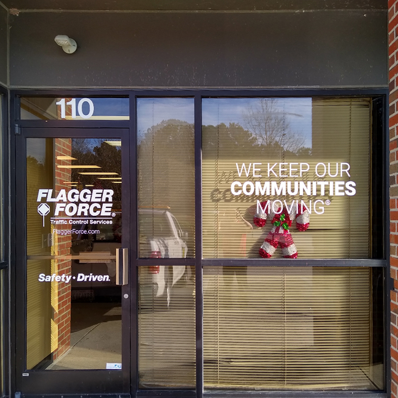Storefront window lettering and logo graphics for Flagger Force, Raleigh