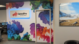 custom wall mural and 3D halo-lit sign