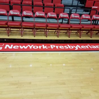 Floor Graphic for NewYork-Presbyterian on St. John's basketball court