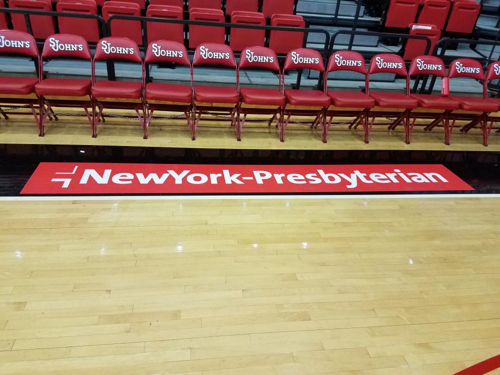 Floor Graphic for NewYork-Presbyterian on St. John's basketball court