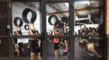 Window Graphics of girls exercising at the gym