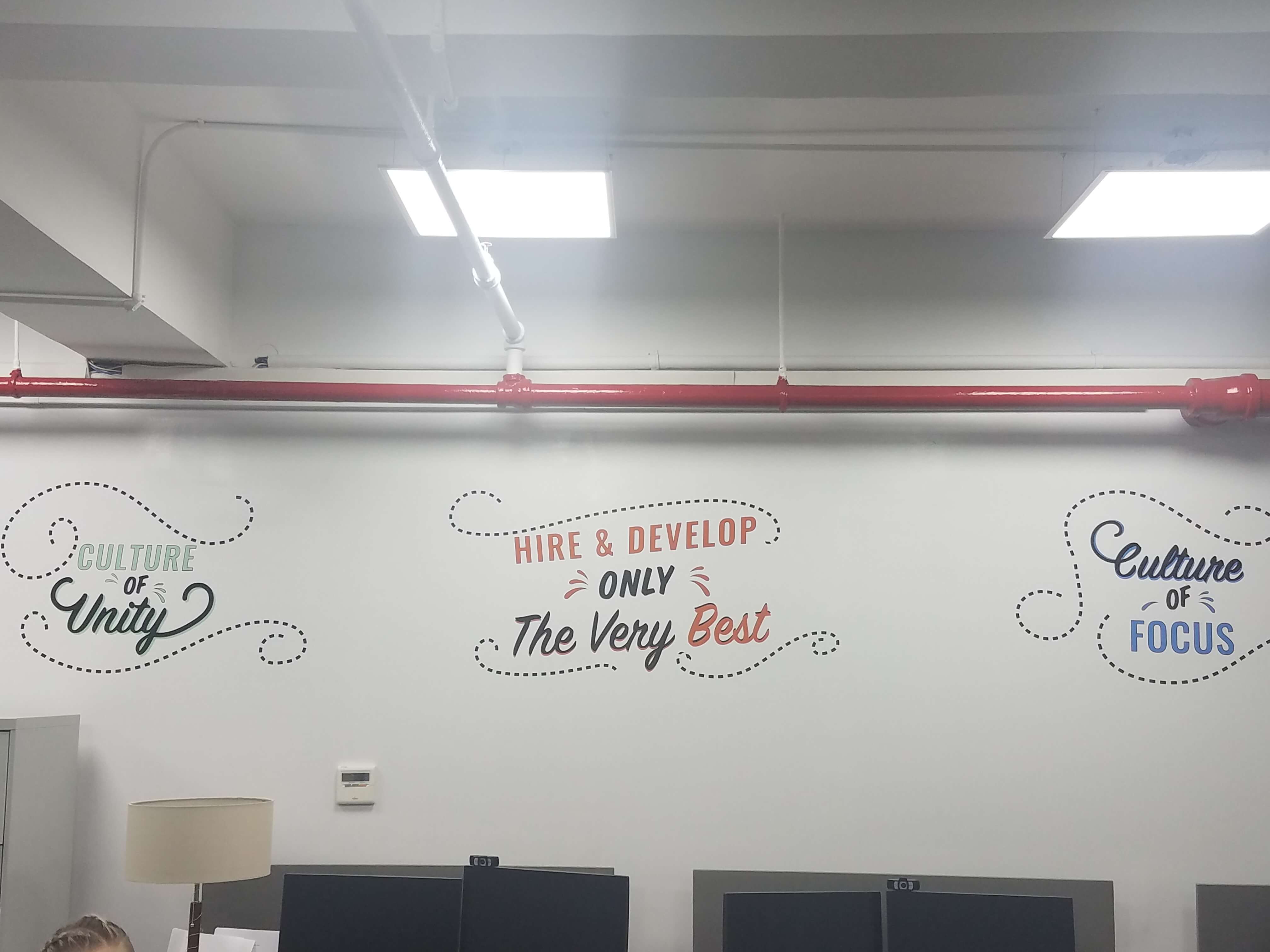Hire and develop wall graphic