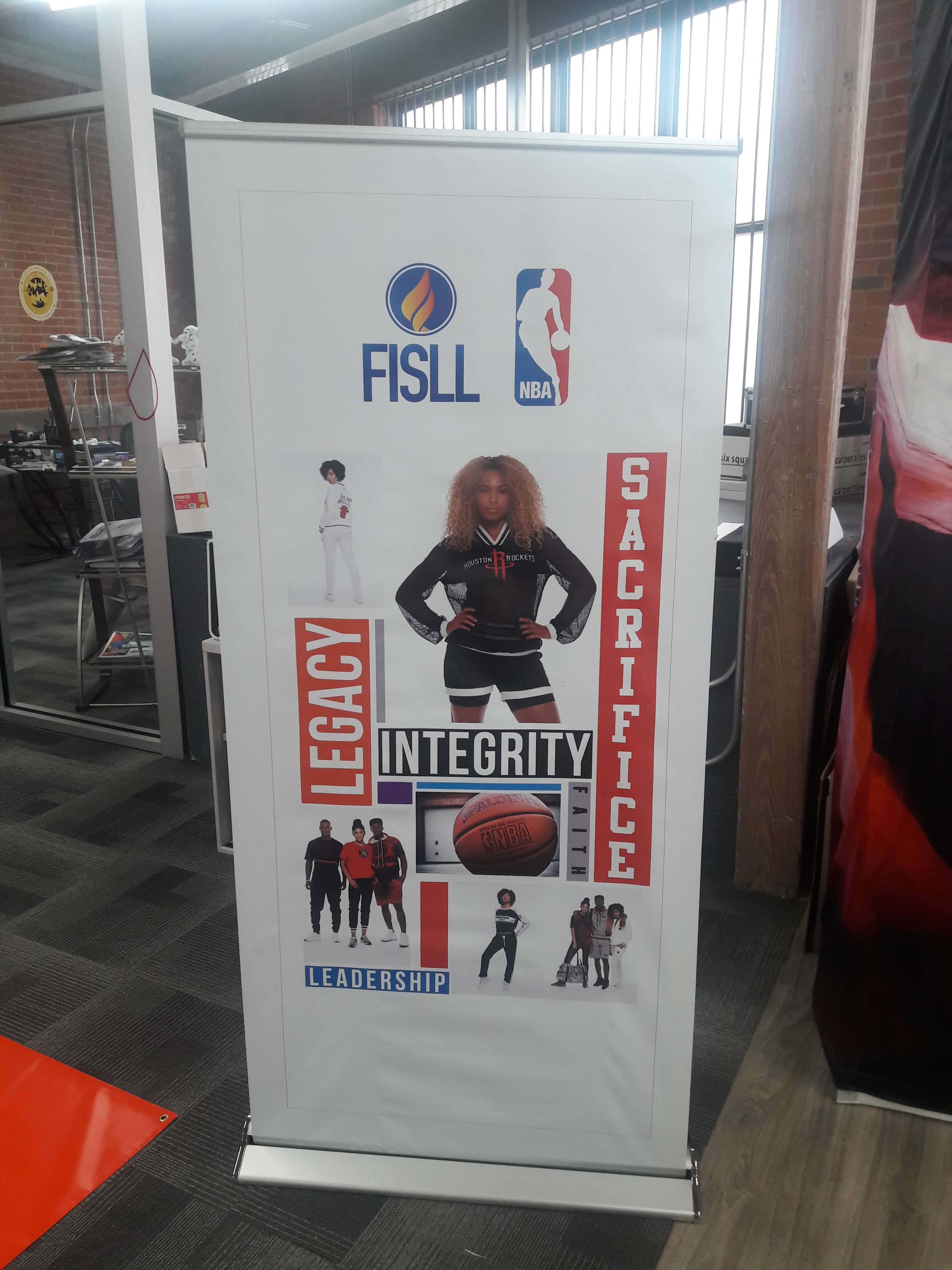FISLL and NBA banner stand
