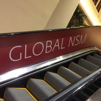 Global NSM escalator wrap