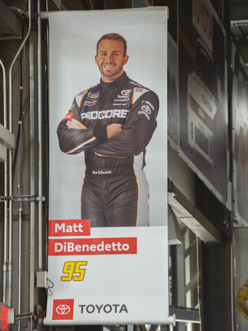 Matt DiBenedetto on pole banner at Daytona Speedway