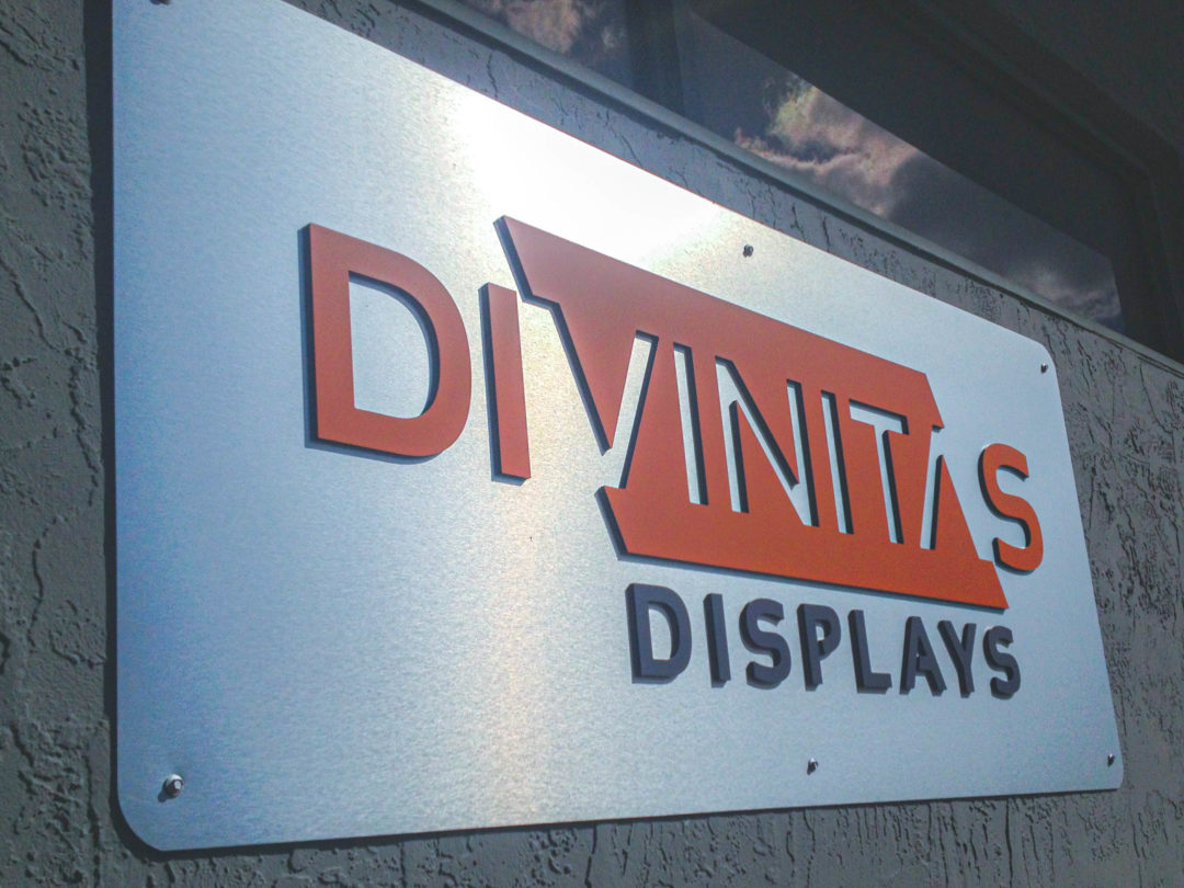 Divinitas dimensional sign outside