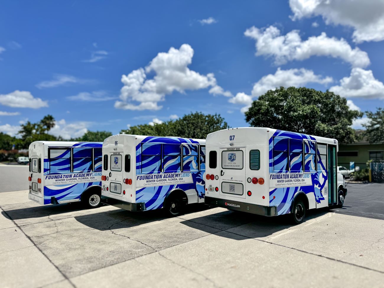 Commercial Vehicle Vinyl Wrap for Foundation Academy Lions Buses