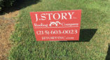 J. Story Roofing Company lawn sign