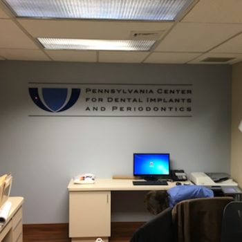 Pennsylvania Center for Dental Implants and Periodontics wall sign