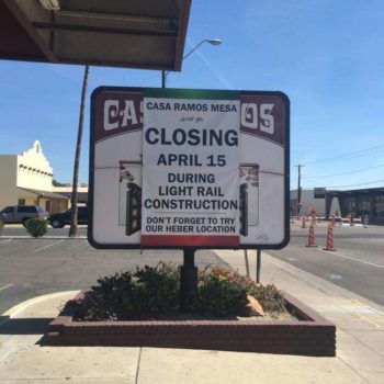 Outdoor Banner announcing the temporary closing of a restaurant during light rail construction