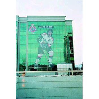 Hockey player window graphic on large building