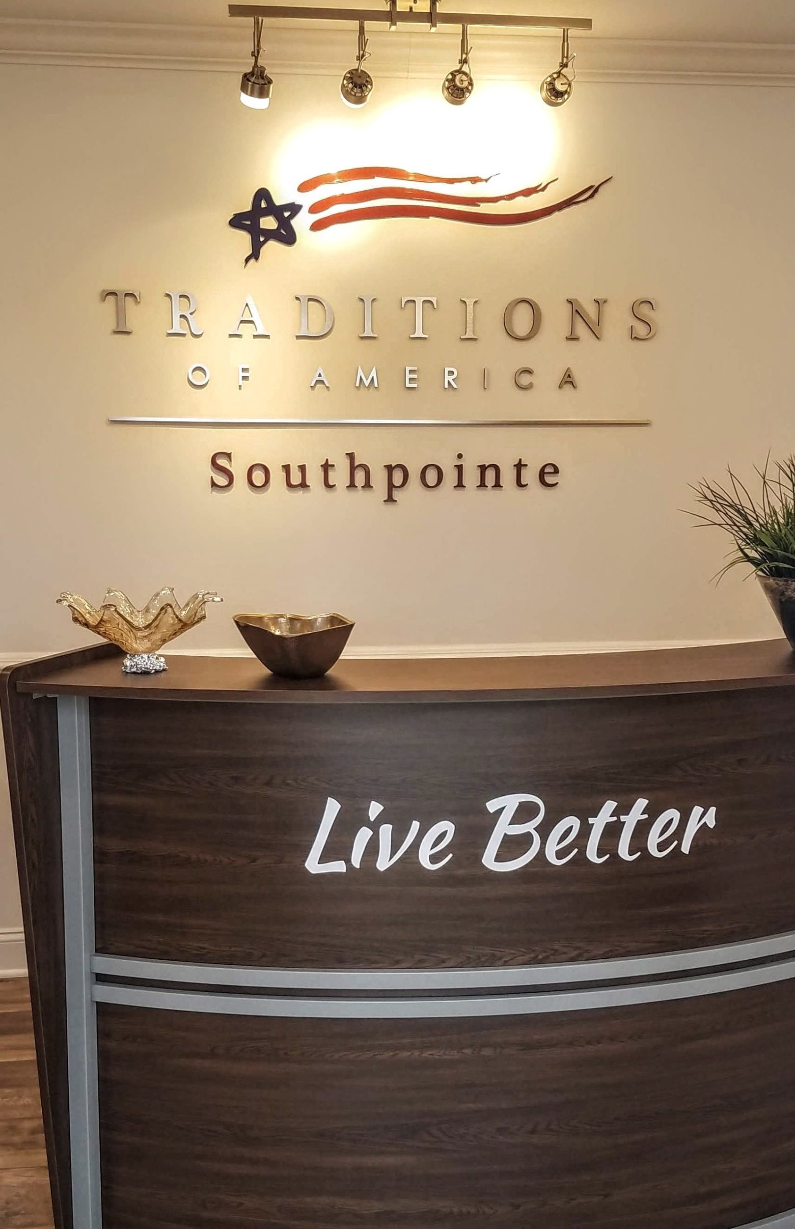 Senior Living Traditions of America lettering sign 