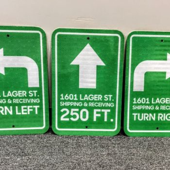 Directional reflective metal signs