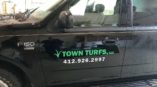 Town Turfs LLC logo and phone number vehicle decals