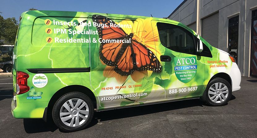 ATCO Pest Control vehicle wrap with butterfly image